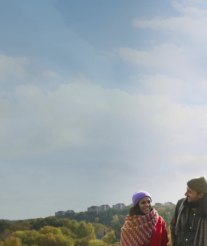 Two friends chatting on a walk